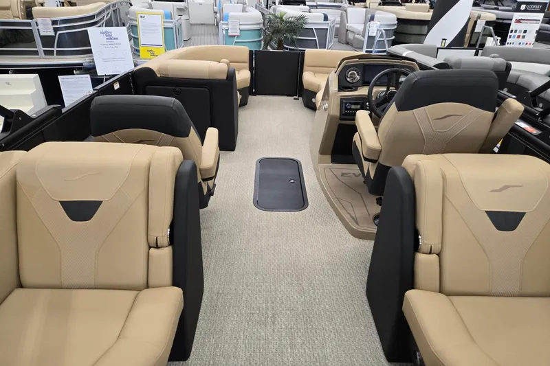 Slide: The Image of Luxurious interior of 2026 Evotti 521QL boat with beige seating and modern dashboard. - 25