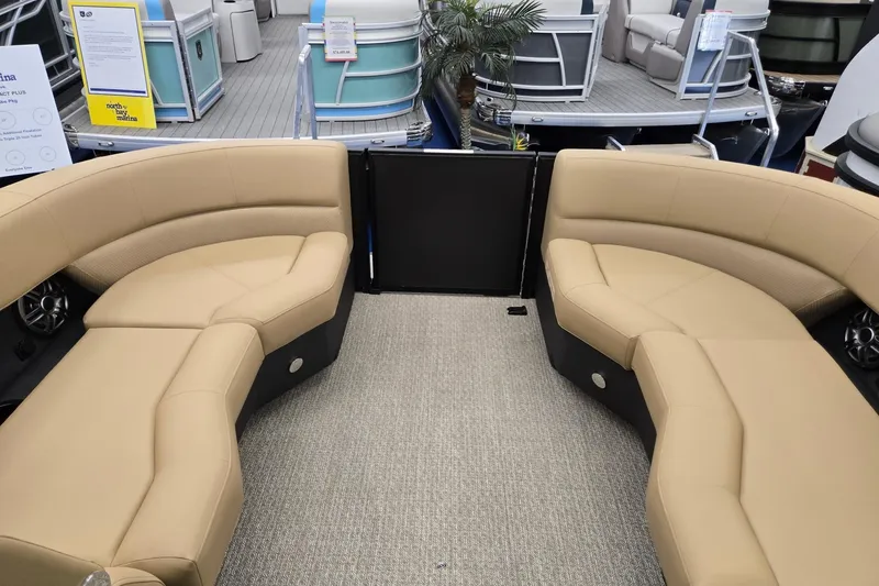 Slide: The Image of Luxurious seating area on a 2026 Evotti 521QL boat, featuring beige upholstery. - 31