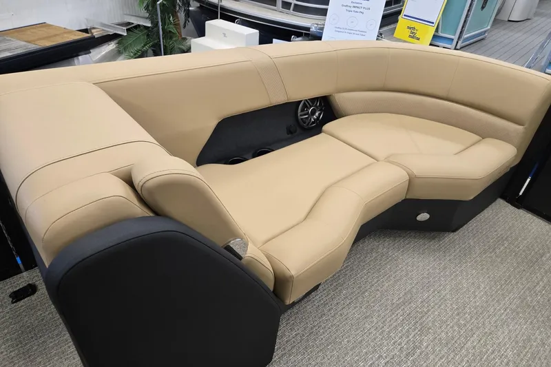 Slide: The Image of Luxurious beige seating in a 2026 Evotti 521QL boat interior. - 33