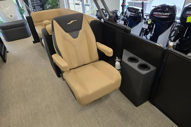 Slide: The Image of Luxurious Evotti 521QL 2026 boat seat with armrests and cup holders in showroom. - 8