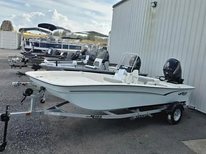 The Image of 2026 Mako Pro Skiff 17 CC on trailer, parked outdoors. - 1