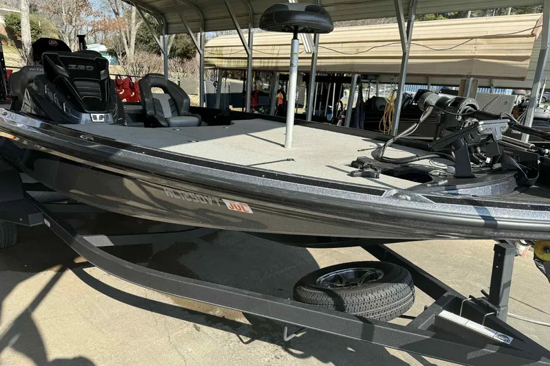 Slide: The Image of 2023 Nitro Z20 Pro fishing boat on trailer under shelter. - 8