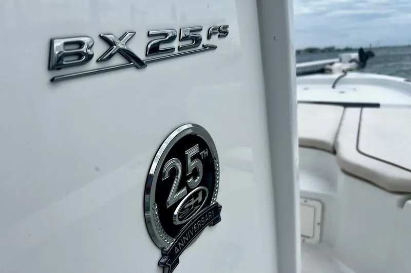Slide: The Image of 2021 Sea Hunt BX 25 FS boat with 25th anniversary emblem. - 16