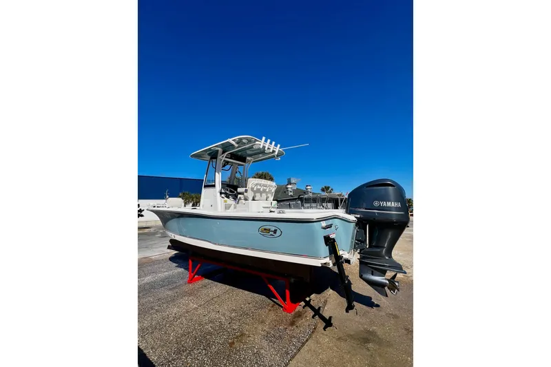 Slide: The Image of 2021 Sea Hunt BX 25 FS boat with Yamaha engine on display. - 24