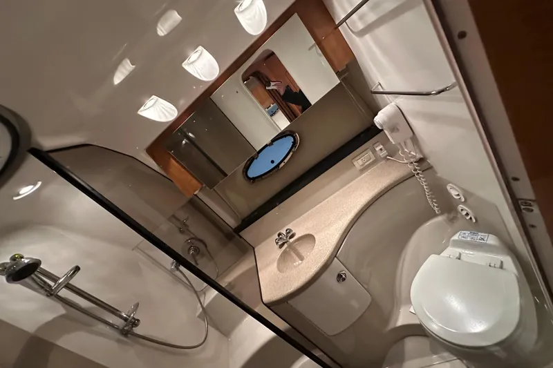 Slide: The Image of Luxurious bathroom in 2004 Regal Commodore 3860 yacht with modern amenities. - 20