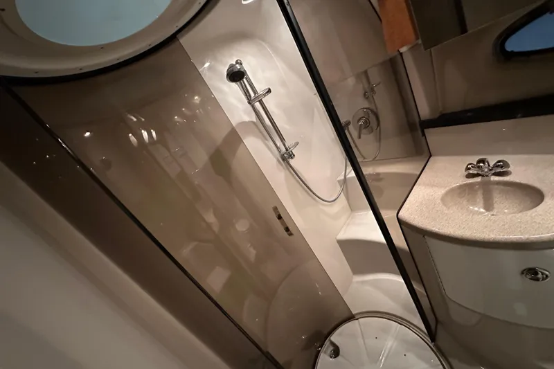 Slide: The Image of Bathroom interior of 2004 Regal Commodore 3860 yacht with shower and sink. - 21