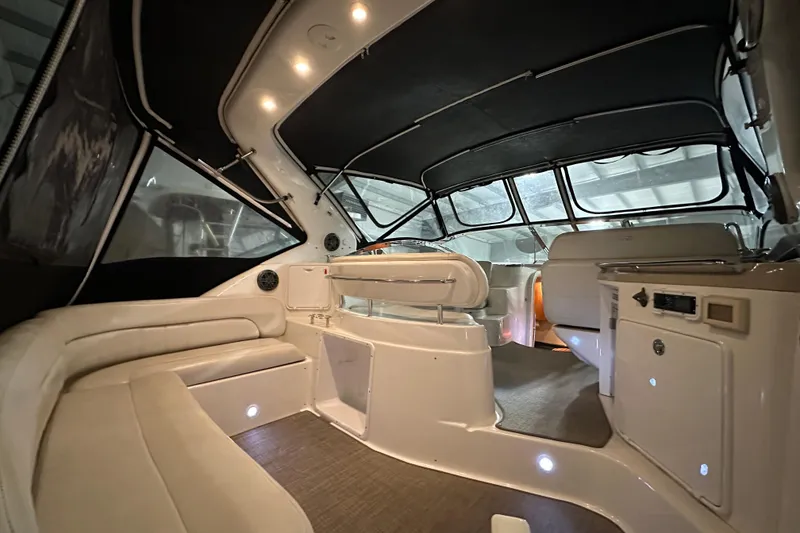 Slide: The Image of 2004 Regal Commodore 3860 yacht interior with seating and modern amenities. - 4