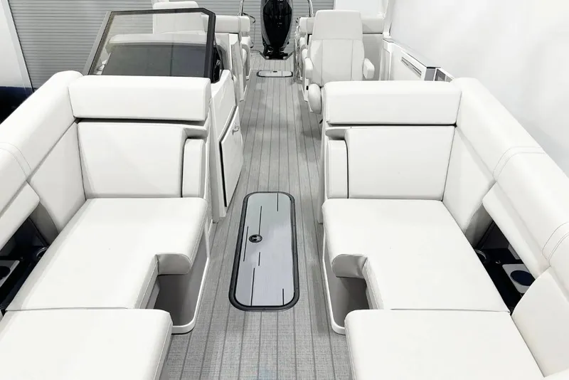 Slide: The Image of Luxurious interior of 2025 Balise Helix 24C boat with white seating and sleek design. - 7