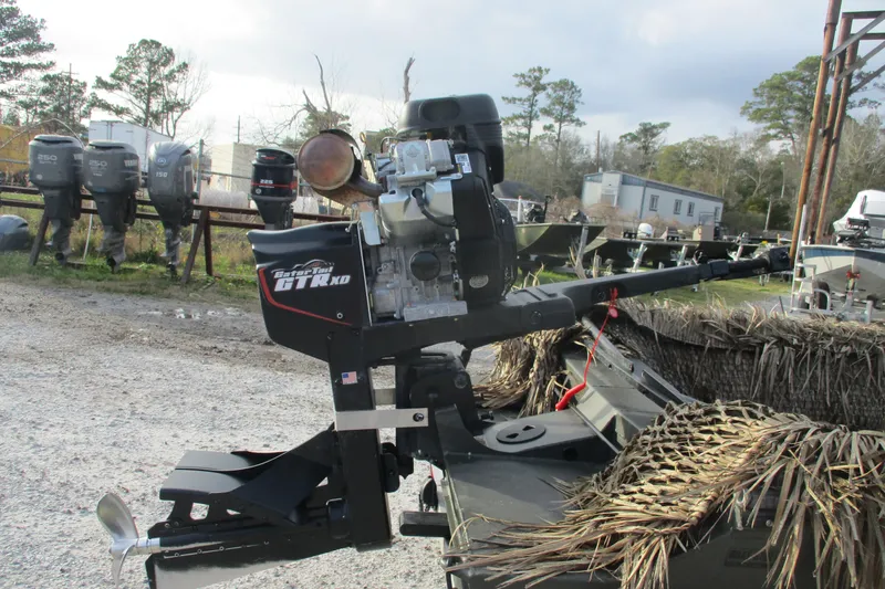 Slide: The Image of 2026 Gator Tail 1748 GATOR boat motor in outdoor setting. - 6