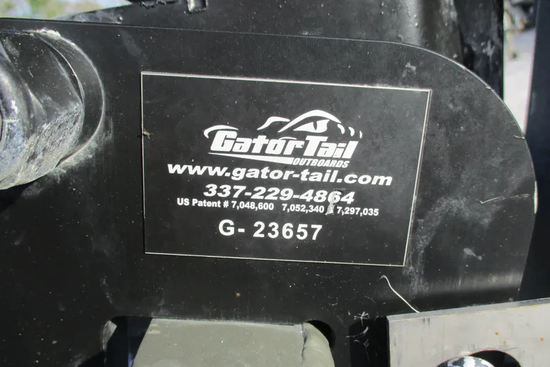Slide: The Image of Close-up of Gator Tail 1748 GATOR 2026 model label with contact details and patent numbers. - 9