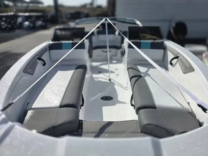 Slide: The Image of Interior view of 2026 Tahoe T21 boat with gray seating. - 10