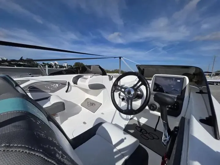 Slide: The Image of Interior of 2026 Tahoe T21 boat with modern helm. - 14