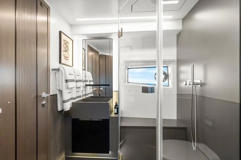 Slide: The Image of Modern bathroom in 2025 Pearl 63 yacht, featuring sleek design and elegant fixtures. - 48