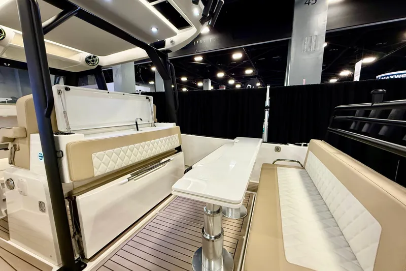 Slide: The Image of Luxurious interior of 2026 Zodiac X9CC boat with elegant seating and table. - 10