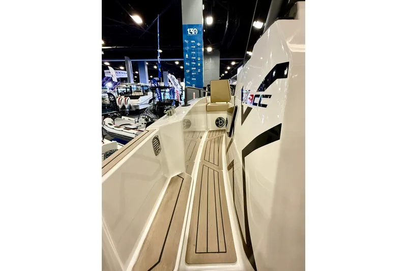 Slide: The Image of 2026 Zodiac X9CC boat interior at a boat show, featuring sleek design and modern amenities. - 17