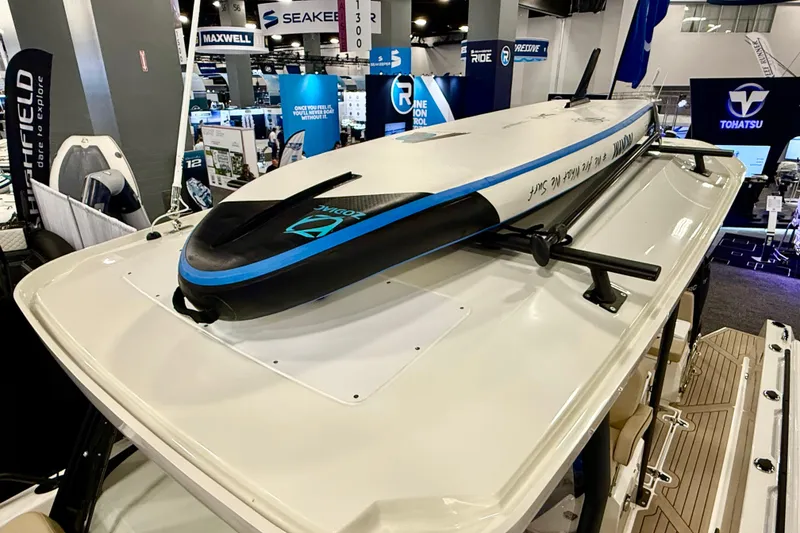 Slide: The Image of 2026 Zodiac X9CC paddleboard displayed at a marine exhibition, featuring sleek design and advanced technology. - 24