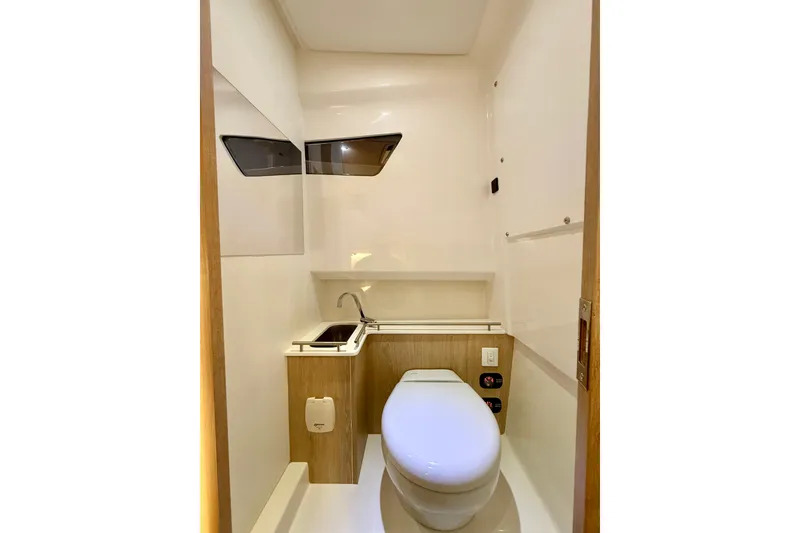 Slide: The Image of Compact modern bathroom in Zodiac X9CC 2026 model, featuring sleek design and efficient use of space. - 26