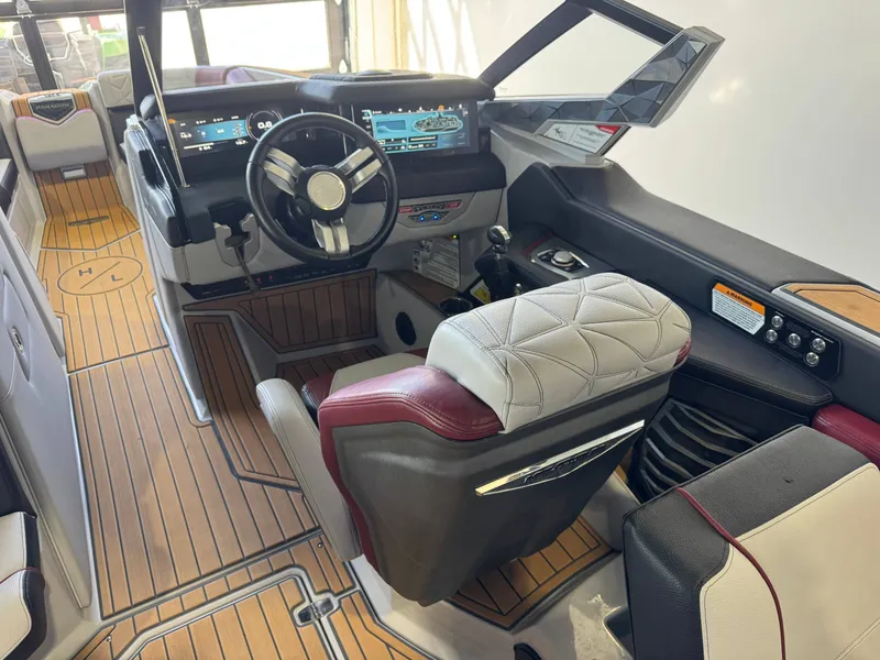 Slide: The Image of Interior of 2023 Nautique Super Air Nautique G23 Paragon with modern cockpit. - 24