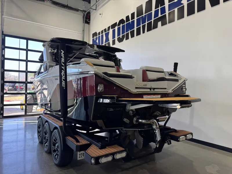 Slide: The Image of 2023 Nautique Super Air G23 Paragon in showroom. - 5
