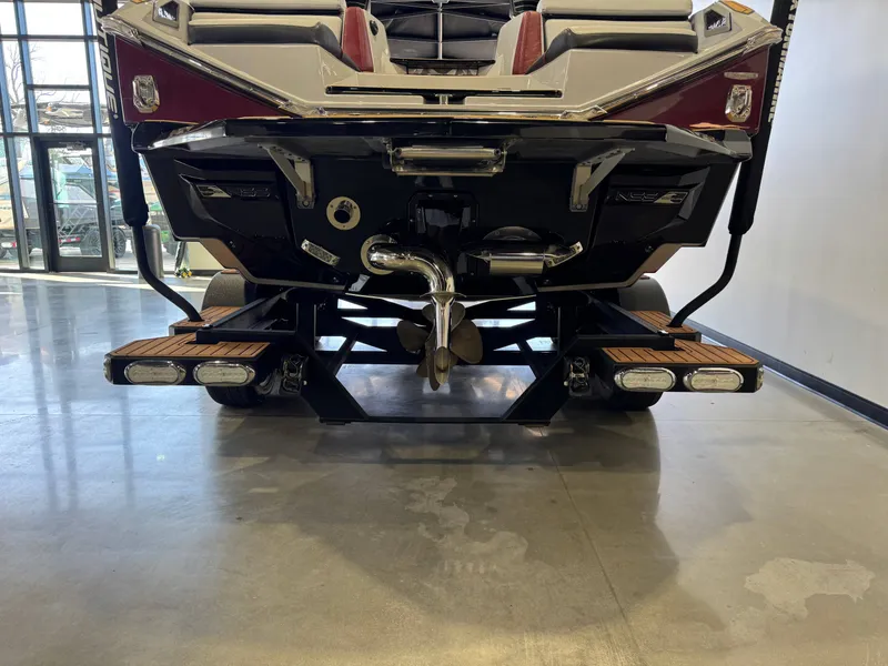 Slide: The Image of 2023 Nautique Super Air Nautique G23 Paragon rear view in showroom. - 7