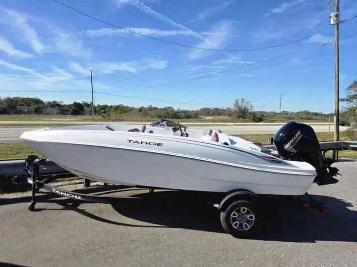 Slide: The Image of 2026 Tahoe T18 boat on trailer in sunny weather. - 3