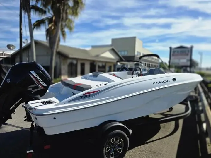 Slide: The Image of 2026 Tahoe T18 boat on trailer, ready for adventure. - 7