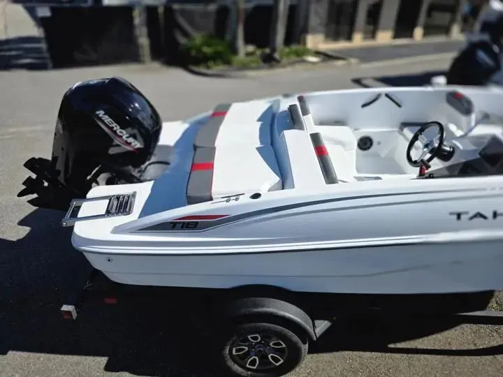 Slide: The Image of 2026 Tahoe T18 boat with Mercury outboard motor. - 8