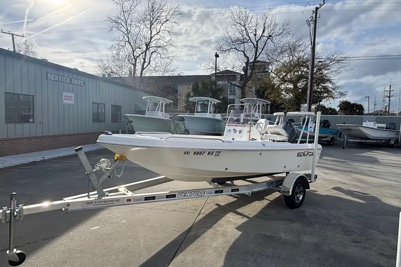 Slide: The Image of 2005 Sea Fox 160 Center Console boat on trailer at service department. - 5