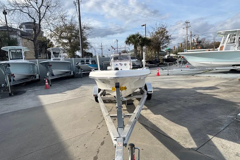 Slide: The Image of 2005 Sea Fox 160 Center Console boat on trailer in outdoor dealership lot. - 6