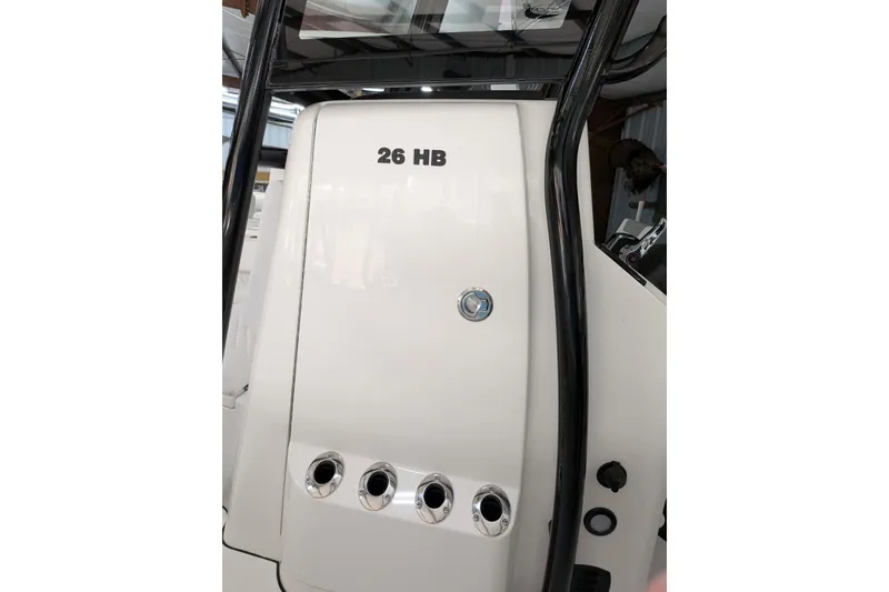 Slide: The Image of 2026 Caymas 26 HB boat console with sleek design and chrome accents. - 6