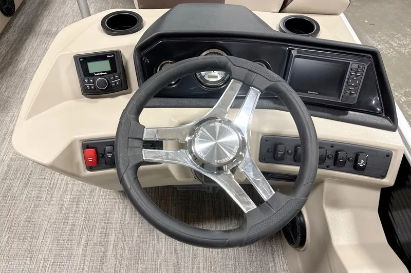 Slide: The Image of Steering console of 2026 Bennington 22 SSR boat with modern controls and navigation system. - 10