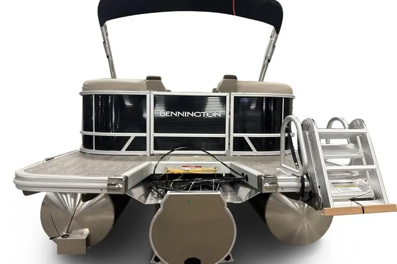 Slide: The Image of 2026 Bennington 22 SSR pontoon boat with sleek design and rear ladder. - 5