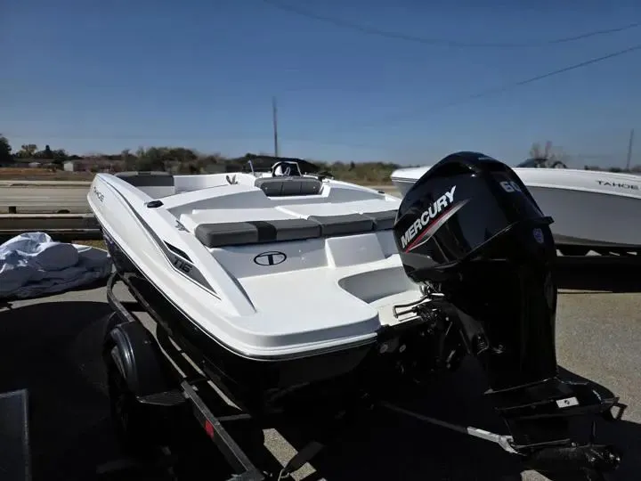 Slide: The Image of 2026 Tahoe T16 boat with Mercury engine on trailer. - 2