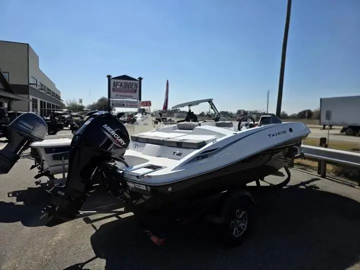 Slide: The Image of 2026 Tahoe T16 boat on a trailer at McKibben. - 4