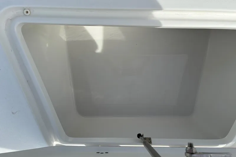 Slide: The Image of Open storage compartment on 2026 Sea Pro 250 Bay boat. - 15