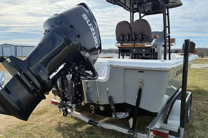 Slide: The Image of 2026 Sea Pro 250 Bay boat with Suzuki outboard motor on trailer. - 6