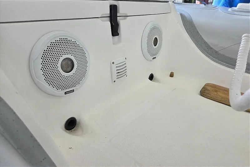 Slide: The Image of Interior of 2015 AB Inflatables Oceanus 12 VST, featuring Fusion speakers and Evinrude 50HP engine. - 11