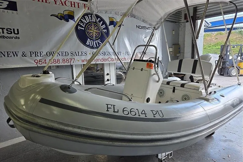 Slide: The Image of 2015 AB Inflatables Oceanus 12 VST with Evinrude 50HP, displayed at Tender Care Boats. - 6