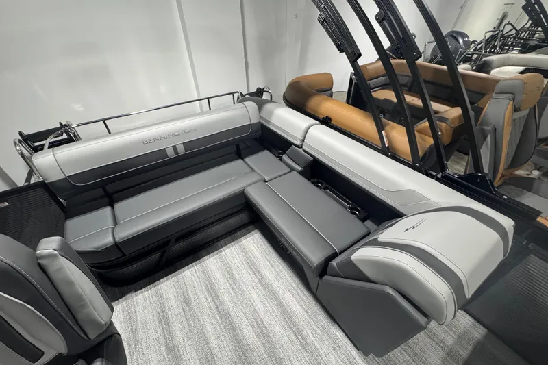 Slide: The Image of 2026 Bennington 22 SSB Sport boat interior with sleek gray seating and modern design. - 11