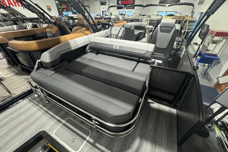 Slide: The Image of 2026 Bennington 22 SSB Sport pontoon boat interior with luxurious seating. - 15