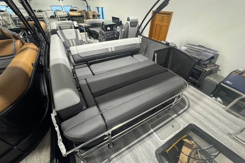 Slide: The Image of 2026 Bennington 22 SSB Sport pontoon boat interior with luxurious seating and modern design. - 16