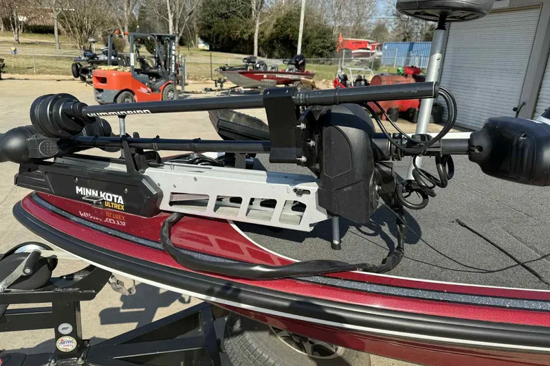 Slide: The Image of 2014 Nitro Z-8 boat with Minn Kota Ultrex trolling motor in outdoor setting. - 9