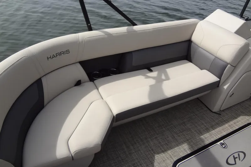 Slide: The Image of 2022 Harris FloteBote 230 Cruiser interior seating with elegant upholstery and cup holders. - 15