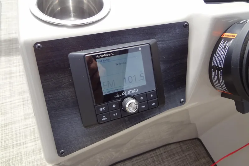 Slide: The Image of JL Audio MediaMaster 50 radio on 2022 Harris FloteBote 230 Cruiser dashboard. - 20