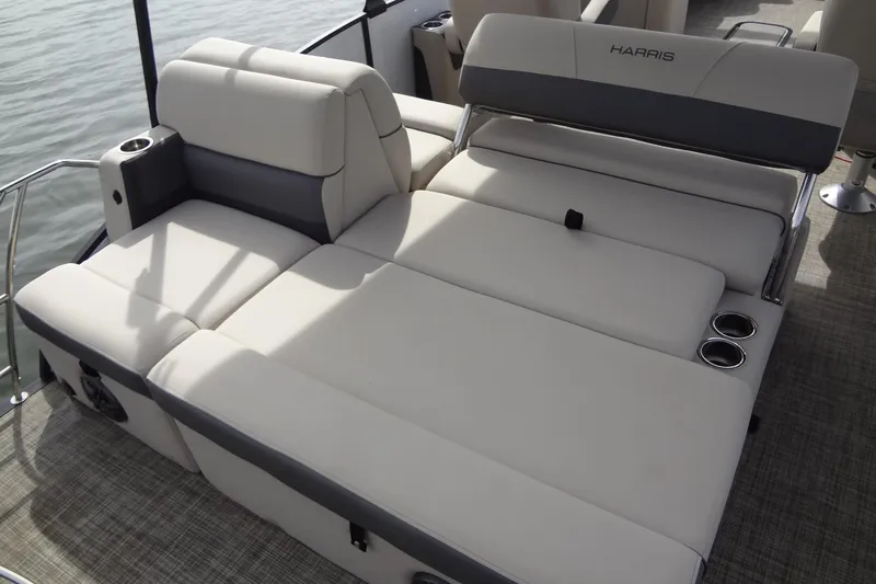 Slide: The Image of Luxurious seating on 2022 Harris FloteBote 230 Cruiser pontoon boat with cup holders. - 25