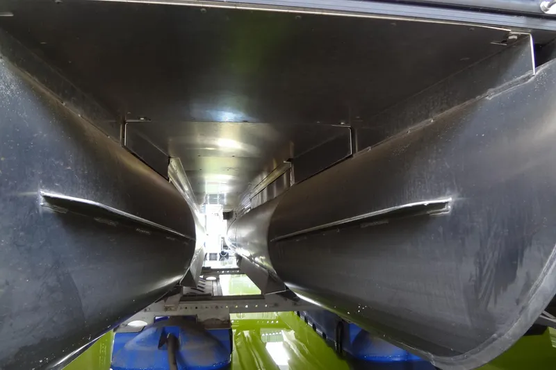 Slide: The Image of Underneath view of 2022 Harris FloteBote 230 Cruiser pontoon boat hull. - 45