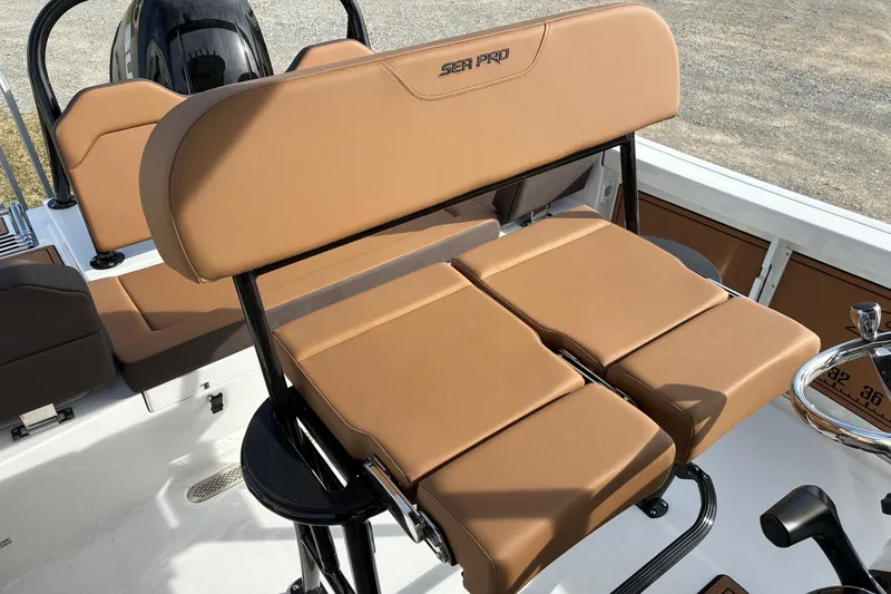 Slide: The Image of 2026 Sea Pro 225FLX Sandbar boat with tan seating and sleek design. - 8