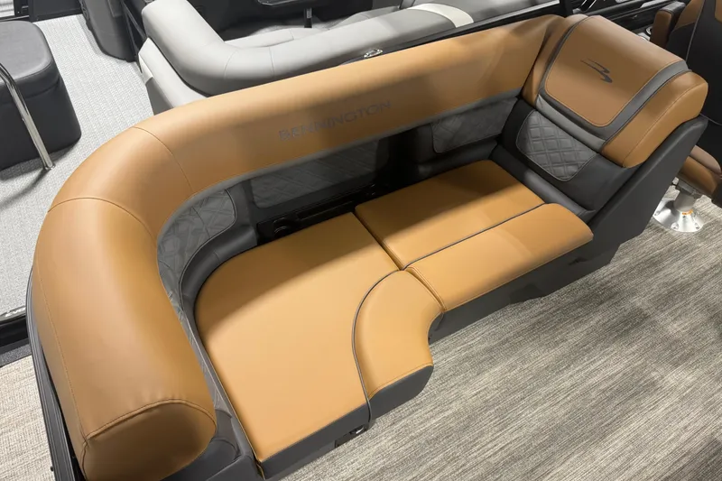 Slide: The Image of Luxurious seating on 2026 Bennington 22 SSR Luxe boat, featuring tan and gray upholstery. - 15
