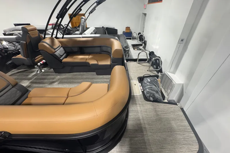 Slide: The Image of 2026 Bennington 22 SSR Luxe pontoon boat interior with luxurious seating and modern design. - 21