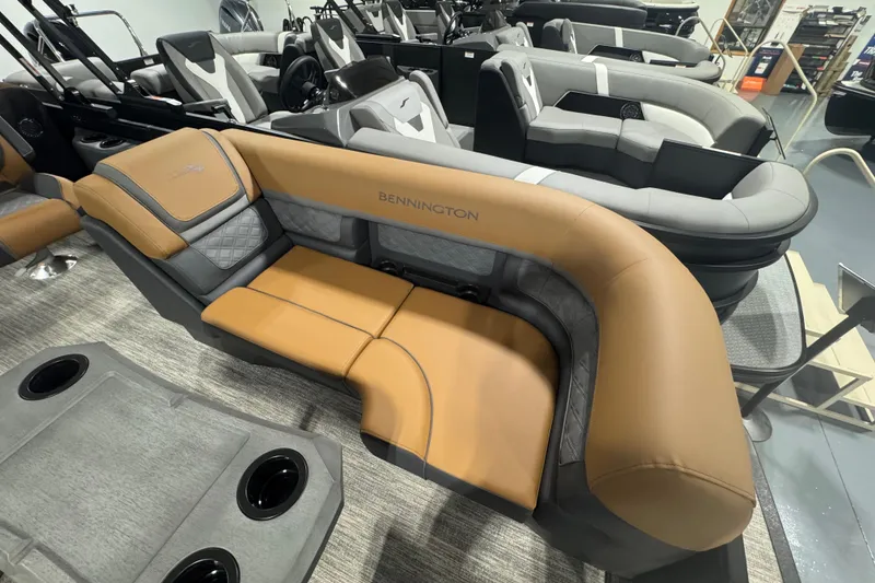 Slide: The Image of 2026 Bennington 22 SSR Luxe boat interior with luxurious tan and gray seating. - 5